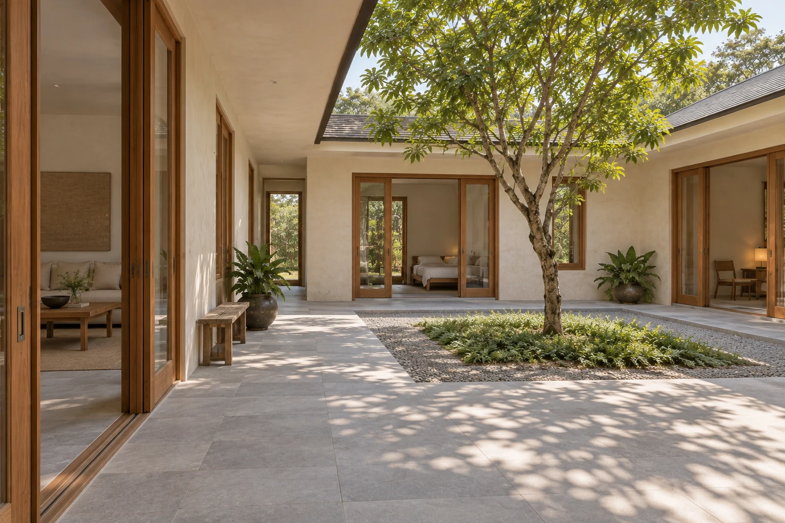Shaded corridor following the same square courtyard.